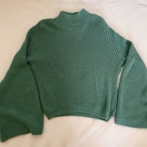 high neck flare out sweater